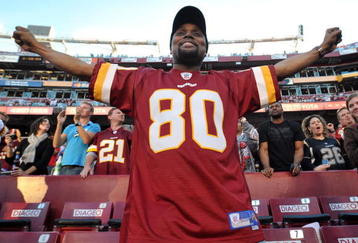LANDOVER, MD - NOVEMBER 15:  A fan of the Washington Redskins celebrates his team's win against the Denver Broncos at FedExField on November 15, 2009 in Landover, Maryland. The Redskins defeated the Broncos 27-17. (Photo by Larry French/Getty Images)