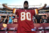 LANDOVER, MD - NOVEMBER 15:  A fan of the Washington Redskins celebrates his team's win against the Denver Broncos at FedExField on November 15, 2009 in Landover, Maryland. The Redskins defeated the Broncos 27-17. (Photo by Larry French/Getty Images)