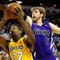 LAS VEGAS - OCTOBER 15:  Ron Artest #37 of the Los Angeles Lakers drives against Andres Nocioni #5 of the Sacramento Kings during their preseason game at the Thomas & Mack Center October 15, 2009 in Las Vegas, Nevada. NOTE TO USER: User expressly acknowledges and agrees that, by downloading and/or using this Photograph, user is consenting to the terms and conditions of the Getty Images License Agreement.  (Photo by Ethan Miller/Getty Images)