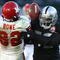 OAKLAND, CA - NOVEMBER 15:  Dwayne Bowe #82 of the Kansas City Chiefs fumbles the ball after being hit by Kirk Morrison #52 of the Oakland Raiders during an NFL game  at Oakland-Alameda County Coliseum on November 15, 2009 in Oakland, California. (Photo by Jed Jacobsohn/Getty Images)