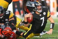PITTSBURGH - NOVEMBER 15: Ben Roethlisberger #7 of the Pittsburgh Steelers is sacked by Jonathan Fanene #68 of the Cincinnati Bengals at Heinz Field on November 15, 2009 in Pittsburgh, Pennsylvania.  (Photo by Rick Stewart/Getty Images)