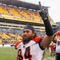 PITTSBURGH - NOVEMBER 15: Domata Peko #94 of the Cincinnati Bengals celebrates defeating the Pittsburgh Steelers at Heinz Field on November 15, 2009 in Pittsburgh, Pennsylvania. The Bengals won 18-12. (Photo by Rick Stewart/Getty Images)