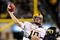EUGENE,OR - NOVEMBER 14: Quarterback Samson Szakacsy #10 of the Arizona State Sun Devils throws a touchdown pass as linebacker Kenny Rowe #58 of the Oregon Ducks applies pressure in the third quarter of the game at Autzen Stadium on November 14, 2009 in Eugene, Oregon. Oregon Defeated arizona State 44-21. (Photo by Steve Dykes/Getty Images)