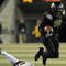 EUGENE,OR - NOVEMBER 14: Running back LaMichael James #21of the Oregon Ducks leaps over the the tackle of linebacker Mike Nixon #25 of the Arizona State Sun Devils in the first quarter of the game at Autzen Stadium on November 14, 2009 in Eugene, Oregon. James has 118 yards and 3 touchdowns in the first half of the game. (Photo by Steve Dykes/Getty Images)