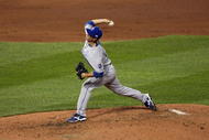 ST. LOUIS, MO - JULY 14:  American League All-Star Zack Greinke of the Kansas City Royals pitches during the 2009 MLB All-Star Game at Busch Stadium on July 14, 2009 in St Louis, Missouri. (Photo by Elsa/Getty Images)