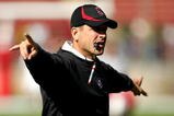 PALO ALTO, CA - NOVEMBER 07:  Stanford Cardinal head coach Jim Harbaugh instructs his team during warmups before their game against the Oregon Ducks at Stanford Stadium on November 7, 2009 in Palo Alto, California.  (Photo by Ezra Shaw/Getty Images)