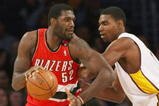 LOS ANGELES - JANUARY 4:  Greg Oden #52 of the Portland Trail Blazers drives against Andrew Bynum #17 of the Los Angeles Lakers on January 4, 2009 at Staples Center in Los Angeles, California.    NOTE TO USER: User expressly acknowledges and agrees that, by downloading and/or using this Photograph, user is consenting to the terms and conditions of the Getty Images License Agreement. (Photo by Stephen Dunn/Getty Images)