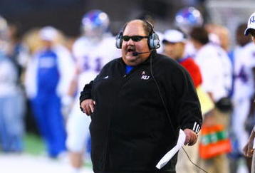 BOULDER, CO - OCTOBER 17: Head coach Mark Mangino of the Kansas Jayhawks calls a play during the game against the University of Colorado at Folsom Field on October 17, 2009 in Boulder, Colorado. (Photo by Garrett W. Ellwood/Getty Images)