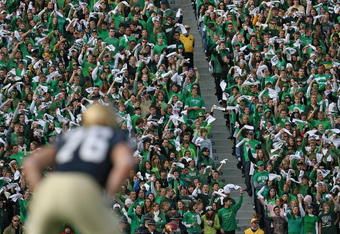 SOUTH BEND, IN - OCTOBER 17: Student fans of the Notre Dame Fighting Irish wave towels before a kick-off against the USC Trojans at Notre Dame Stadium on October 17, 2009 in South Bend, Indiana. USC defeated Notre Dame 34-27. (Photo by Jonathan Daniel/Getty Images)