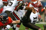 CHICAGO - NOVEMBER 01: Joshua Cribbs #16 of the Cleveland Browns is upended by Craig Steltz #20 of the Chicago Bears at Soldier Field on November 1, 2009 in Chicago, Illinois. The Bears defeated the Browns 30-6. (Photo by Jonathan Daniel/Getty Images)