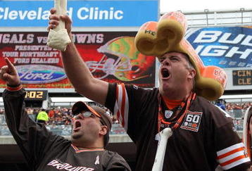 CLEVELAND - OCTOBER 04:  Fans of the Cleveland Browns cheer on their team as they play the Cincinnati Bengals at Cleveland Browns Stadium on October 4, 2009 in Cleveland, Ohio.  (Photo by Jim McIsaac/Getty Images)