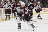 14 Apr 2001:  Peter Forsberg #21 of the Colorado Avalanche takes the puck down the ice during a shift change against the Vancouver Canucks in the third period during game two of their first round playoff game at the Pepsi Center in Denver, Colorado.  The Avalanche won 2-1. <DIGITAL IMAGE> Mandatory Credit: Brian Bahr/ALLSPORT