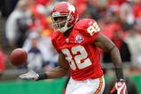 KANSAS CITY, MO - OCTOBER 11:  Dwayne Bowe #82 of the Kansas City Chiefs tries to play the ball during the NFL game against the Dallas Cowboys at Arrowhead Stadiumin on October 11, 2009 Kansas City, Missouri. The Cowboys defeated the Chiefs 26-20 in overtime. (Photo by Jamie Squire/Getty Images)