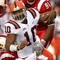 LOUISVILLE, KY - NOVEMBER 26:  Zach Anderson #96 of Louisville sacks Perry Paterson #10 of Syracuse in the second quarter November 26, 2005 at Papa John's Cardinal Stadium in Louisville, Kentucky.  (Photo by Matthew Stockman/Getty Images)