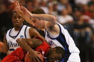 TAMPA, FL - MARCH 21:  Adam Emmenecker #15 of the Drake Bulldogs guards Tyrone Brazelton #3 of the Western Kentucky Hilltoppers during the first round of the 2008 NCAA Tournament West Regional at the St. Pete Times Forum on March 21, 2008 in Tampa, Florida.  (Photo by Doug Benc/Getty Images)
