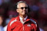 COLUMBUS, OH - OCTOBER 10:  Head coach Jim Tressel of the Ohio State Buckeyes looks up at the clock during a game against the Wisconsin Badgers at Ohio Stadium on October 10, 2009 in Columbus, Ohio.  Ohio State defeated Wisconsin 31-13.  (Photo by Jamie Sabau/Getty Images)