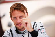 ABU DHABI, UNITED ARAB EMIRATES - OCTOBER 30:  Jenson Button of Great Britain and Brawn GP is seen in the paddock before practice for the Abu Dhabi Formula One Grand Prix at the Yas Marina Circuit on October 30, 2009 in Abu Dhabi, United Arab Emirates.  (Photo by Mark Thompson/Getty Images)
