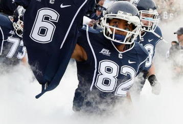 EAST HARTFORD, CT - OCTOBER 31:  Kashif Moore #82 of the Connecticut Huskies carries out the jersey of murdered teammate Jasper Howard #6 before the game against the Rutgers Scarlet Knights on October 31, 2009 at Rentschler Field in East Hartford, Connecticut.  (Photo by Elsa/Getty Images)