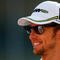ABU DHABI, UNITED ARAB EMIRATES - NOVEMBER 01:  Jenson Button of Great Britain and Brawn GP attends the drivers parade before the Abu Dhabi Formula One Grand Prix at the Yas Marina Circuit on November 1, 2009 in Abu Dhabi, United Arab Emirates.  (Photo by Mark Thompson/Getty Images)