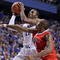 LEXINGTON, KY - NOVEMBER 16: John Wall #11 of the Kentucky Wildcats shoots the ball while defended by Kenny Hayes #14 of the Miami University Redhawks during the game at Rupp Arena on November 16, 2009 in Lexington, Kentucky. (Photo by Andy Lyons/Getty Images)