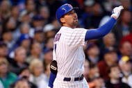 CHICAGO - OCTOBER 01:  Mark DeRosa #7 of the Chicago Cubs hits a 2-run home run in the bottom of the second inning against the Los Angeles Dodgers in Game One of the NLDS during the 2008 MLB Playoffs at Wrigley Field on October 1, 2008 in Chicago, Illinois.  (Photo by Jamie Squire/Getty Images)