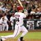 PHOENIX - APRIL 10: Conor Jackson #34 of the Arizona Diamondbacks hits a two-run single against the Los Angeles Dodgers during the third inning of the game at Chase Field on April 10, 2009 in Phoenix, Arizona. (Photo by Christian Petersen/Getty Images)