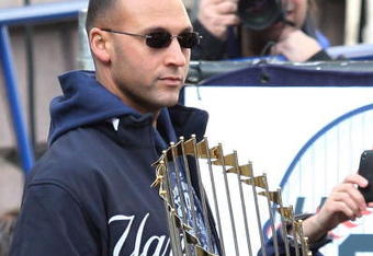 NEW YORK - NOVEMBER 06:  Captain Derek Jeter #2 of the New York Yankees celebrates with the championship trophy during the New York Yankees World Series Victory Celebration at City Hall on November 6, 2009 in New York, New York.  (Photo by Jim McIsaac/Getty Images)