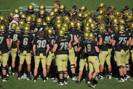 BOULDER, CO - NOVEMBER 07: The Colorado Buffaloes huddle on the field as the prepare to face the Texas A&M Aggies during NCAA college football action at Folsom Field on November 7, 2009 in Boulder, Colorado. Colorado defeated Texas A&M 35-34.  (Photo by Doug Pensinger/Getty Images)