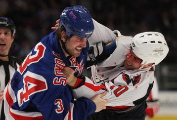 NEW YORK - NOVEMBER 17: Aaron Voros #34 of the New York Rangers and Matt Bradley #10 of the Washington Capitals fight during first period action at Madison Square Garden on November 17, 2009 in New York, New York. (Photo by Bruce Bennett/Getty Images)