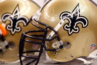 NEW ORLEANS - NOVEMBER 08:  Helmets of the New Orleans Saints at Louisiana Superdome on November 8, 2009 in New Orleans, Louisiana.  (Photo by Ronald Martinez/Getty Images)