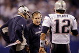 INDIANAPOLIS - NOVEMBER 15: Quarterback Tom Brady #12 of the New England Patriots speaks to head coach Bill Belichick in the fourth quarter of the game against the Indianapolis Colts at Lucas Oil Stadium on November 15, 2009 in Indianapolis, Indiana. The Colts won the game 35-34. (Photo by Andy Lyons/Getty Images)