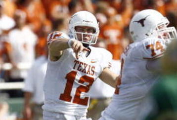WACO, TX - NOVEMBER 14:  Quarterback Colt McCoy #12 of the Texas Longhorns throws to an open receiver during the first half against the Baylor Bears on November 14, 2009 at Floyd Casey Stadium in Waco, Texas. (Photo by Tom Pennington/Getty Images)