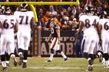 CLEVELAND - NOVEMBER 16: Quarterback Brady Quinn #10 of the Cleveland Browns walks off the field after he threw an interception which was returned for a touchdown in the third quarter by Dawan Landry #26 of the Baltimore Ravens at Cleveland Browns Stadium on November 16, 2009 in Cleveland, Ohio.  (Photo by Matt Sullivan/Getty Images)
