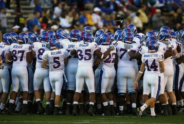 BOULDER, CO - OCTOBER 17: The Kansas Jayhawks huddle up prior to the game against the Colorado Buffaloes at Folsom Field on October 17, 2009 in Boulder, Colorado. (Photo by Garrett W. Ellwood/Getty Images)