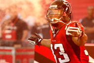 ATLANTA - SEPTEMBER 13:  Michael Turner #33 of the Atlanta Falcons enters the field to face the Miami Dolphins at Georgia Dome on September 13, 2009 in Atlanta, Georgia.  (Photo by Kevin C. Cox/Getty Images)