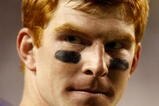 FORT WORTH, TX - NOVEMBER 14:   Quarterback Andy Dalton #14 of the TCU Horned Frogs on the sidelines during the game against The Utah Utes at Amon G. Carter Stadium on November 14, 2009 in Fort Worth, Texas. TCU won the game 55-28. (Photo by Ronald Martinez/Getty Images)