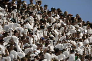EAST LANSING, MI - SEPTEMBER 21: Students and fans of Michigan State rally their team during the NCAA football game against Notre Dame at Spartan Stadium in East Lansing, Michigan on September 21, 2002. The Notre Dame Fighting Irish defeated the Michigan State Spartans 21-17. (Photo by Tom Pidgeon /Getty Images)