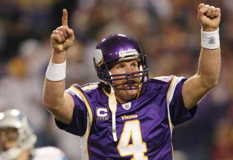MINNEAPOLIS - NOVEMBER 15:  Brett Favre #4 of the Minnesota Vikings celebrates a touchdown in the fourth quarter against the Detroit Lions on November 15, 2009 at Hubert H. Humphrey Metrodome in Minneapolis, Minnesota. The Vikings defeated the Lions 27-10.  (Photo by Elsa/Getty Images)