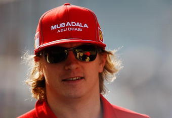 ABU DHABI, UNITED ARAB EMIRATES - NOVEMBER 01:  Kimi Raikkonen of Finland and Ferrari attends the drivers parade before the Abu Dhabi Formula One Grand Prix at the Yas Marina Circuit on November 1, 2009 in Abu Dhabi, United Arab Emirates.  (Photo by Mark Thompson/Getty Images)