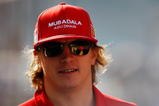 ABU DHABI, UNITED ARAB EMIRATES - NOVEMBER 01:  Kimi Raikkonen of Finland and Ferrari attends the drivers parade before the Abu Dhabi Formula One Grand Prix at the Yas Marina Circuit on November 1, 2009 in Abu Dhabi, United Arab Emirates.  (Photo by Mark Thompson/Getty Images)
