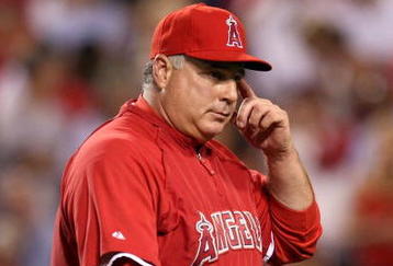 ANAHEIM, CA - OCTOBER 22:  Manager Mike Scioscia of the Los Angeles Angels of Anaheim walks out to the mound during the seventh inning in Game Five of the ALCS against the New York Yankees during the 2009 MLB Playoffs at Angel Stadium on October 22, 2009 in Anaheim, California.  (Photo by Stephen Dunn/Getty Images)