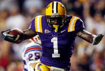 BATON ROUGE, LA - NOVEMBER 14:  Brandon LaFell #1 of the LSU Tigers jumps over Jai Eugene #4 of the Louisiana Tech Bulldogs on his way to scoring a touchdown at Tiger Stadium on November 14, 2009 in Baton Rouge, Louisiana.  (Photo by Chris Graythen/Getty Images)