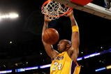 LOS ANGELES - NOVEMBER 6: Kobe Bryant #24 of the Los Angeles Lakers dunks against the Memphis Grizzlies on November 6, 2009 at Staples Center in Los Angeles, California.  NOTE TO USER: User expressly acknowledges and agrees that, by downloading and/or using this Photograph, user is consenting to the terms and conditions of the Getty Images License Agreement. (Photo by Stephen Dunn/Getty Images)