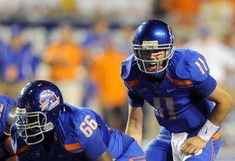 BOISE, ID - SEPTEMBER 3: Quarterback Kellen Moore #6 of the Boise State Broncos barks out signals as center Thomas Byrd #66 of the Boise State Broncos waits to snap the ball in the third quarter of the game against the Oregon Ducks at Bronco Stadium on September 3, 2009 in Boise, Idaho. Boise State won the game 19-8. (Photo by Steve Dykes/Getty Images)