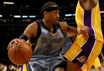 LOS ANGELES - NOVEMBER 6: Allen Iverson #3 of the Memphis Grizzlies drives against Josh Powell #21 of the Los Angeles Lakers on November 6, 2009 at Staples Center in Los Angeles, California. The Lakers won 114-98.  NOTE TO USER: User expressly acknowledges and agrees that, by downloading and/or using this Photograph, user is consenting to the terms and conditions of the Getty Images License Agreement. (Photo by Stephen Dunn/Getty Images)