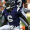 EVANSTON, IL - OCTOBER 31: Gerald Hodges #6 of the Northwestern Wildcats celebrates tackling Lee Coleman #2 of the Penn State Nittany Lions at Ryan Field on October 31, 2009 in Evanston, Illinois. Penn State defeated Northwestern 34-13. (Photo by Jonathan Daniel/Getty Images)