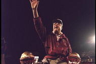 1 Jan 1996:  Head coach Bobby Bowden of the Florida State Seminoles is carried triumphantly off the field by nose guard Andre Wadsworth #8 and tackle Orpheus Roy after defeating the Notre Dame Fighting Irish in the Orange Bowl in Miami, Florida 31-26.  Ma