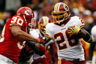LANDOVER, MD - OCTOBER 18: Mike Brown #30 of the Kansas City Chiefs tackles Clinton Portis #26 of the Washington Redskins during their game October 18, 2009 at FedEx Field in Landover, Maryland.The Chiefs won the game 14-6. (Photo by Win McNamee/Getty Images)