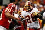 LANDOVER, MD - OCTOBER 18:  Mike Brown #30 of the Kansas City Chiefs tackles Clinton Portis #26 of the Washington Redskins during their game October 18, 2009 at FedEx Field in Landover, Maryland.The Chiefs won the game 14-6.  (Photo by Win McNamee/Getty Images)