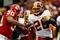 LANDOVER, MD - OCTOBER 18:  Mike Brown #30 of the Kansas City Chiefs tackles Clinton Portis #26 of the Washington Redskins during their game October 18, 2009 at FedEx Field in Landover, Maryland.The Chiefs won the game 14-6.  (Photo by Win McNamee/Getty Images)